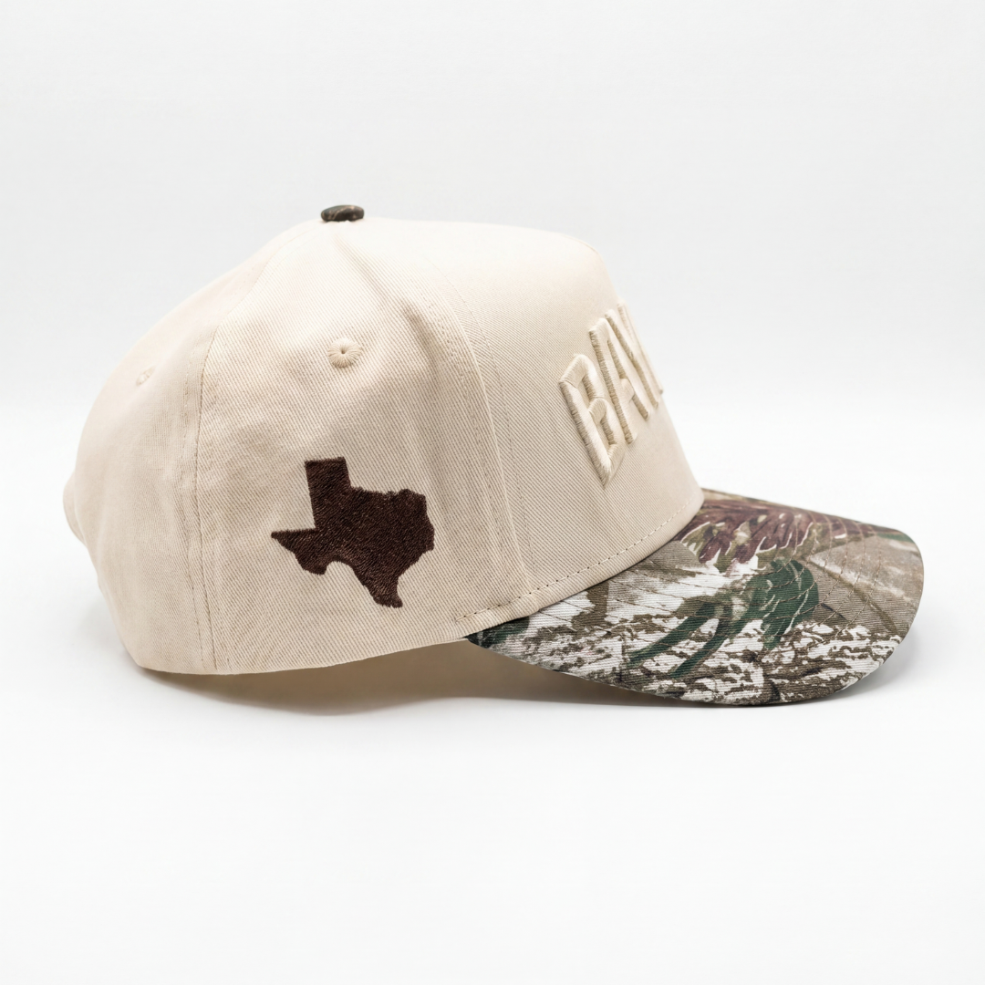 Baylor Bears Texas camo hat angled view showing cream crown, BAYLOR embroidery and camo brim