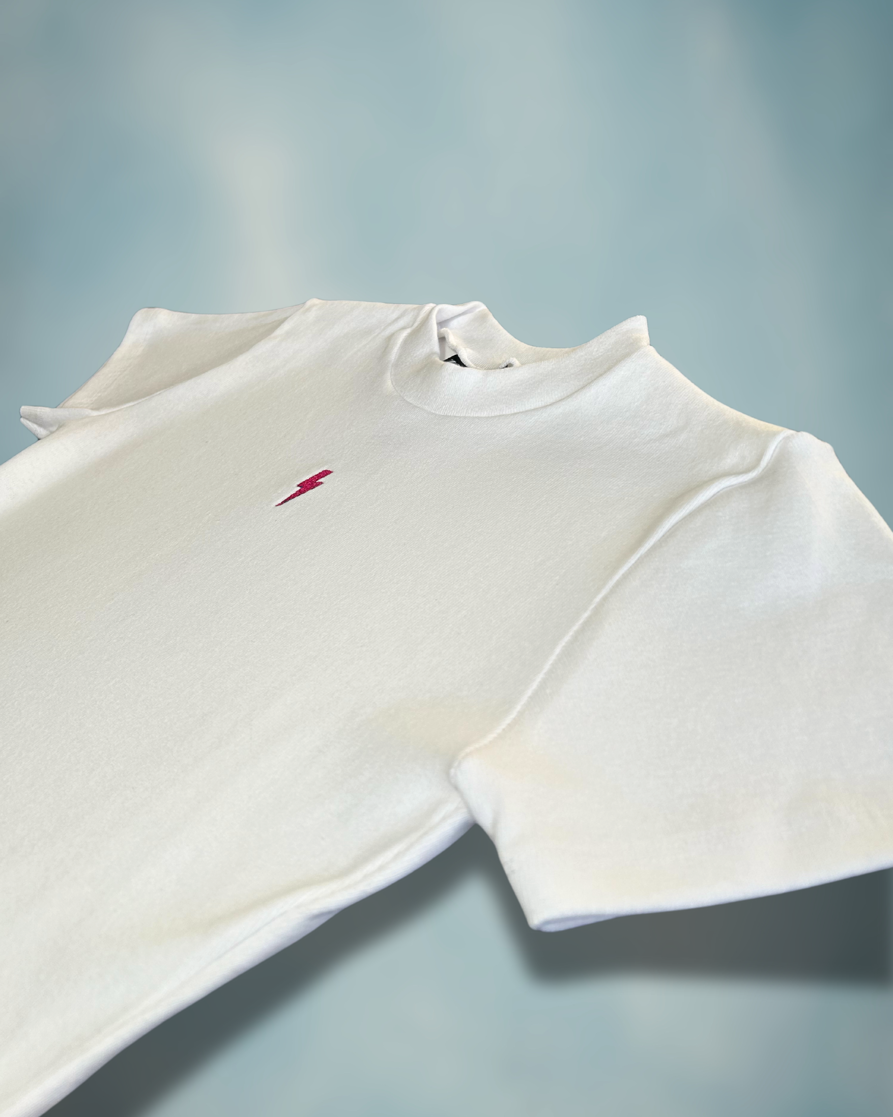 Tiny Spark Baby Tee – Embroidered Pink Lightning Bolt