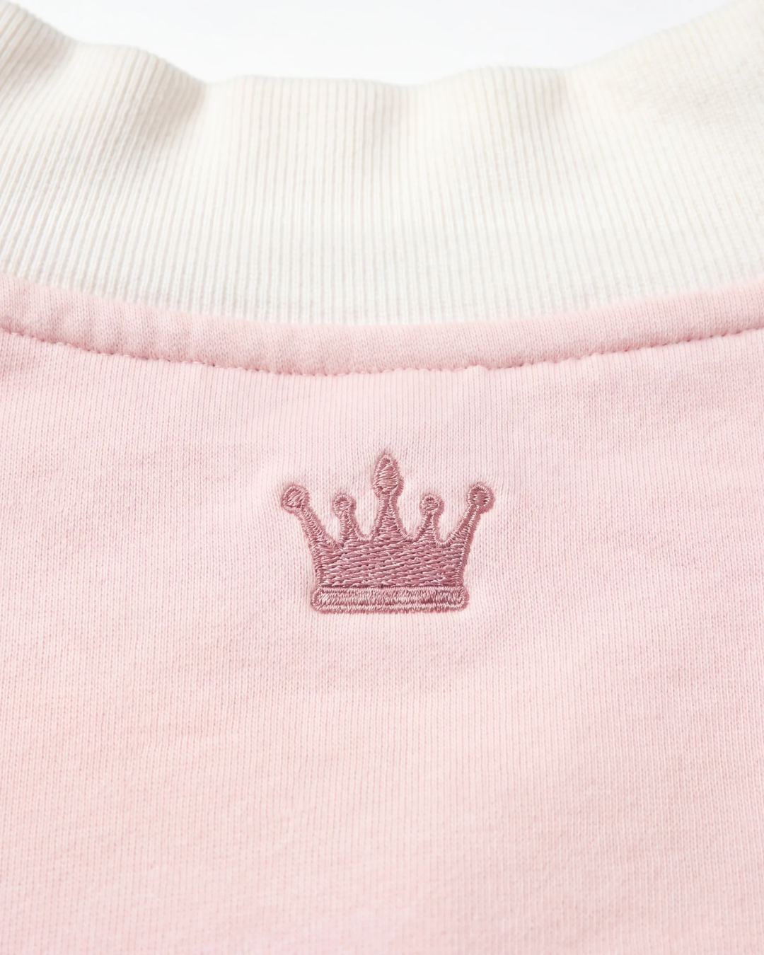 Zeta Mockneck Top crown embroidery detail