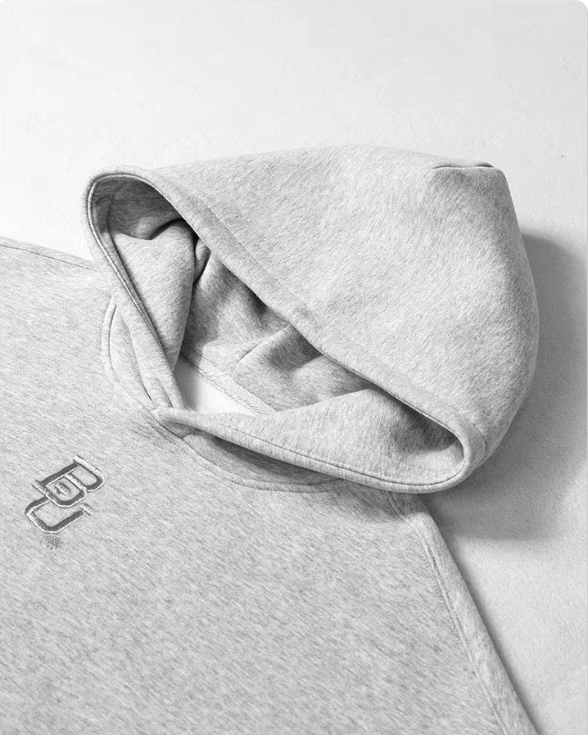 Gray Oatmeal Baylor University hoodie with a 'BU' embroidered logo in the middle on a white background