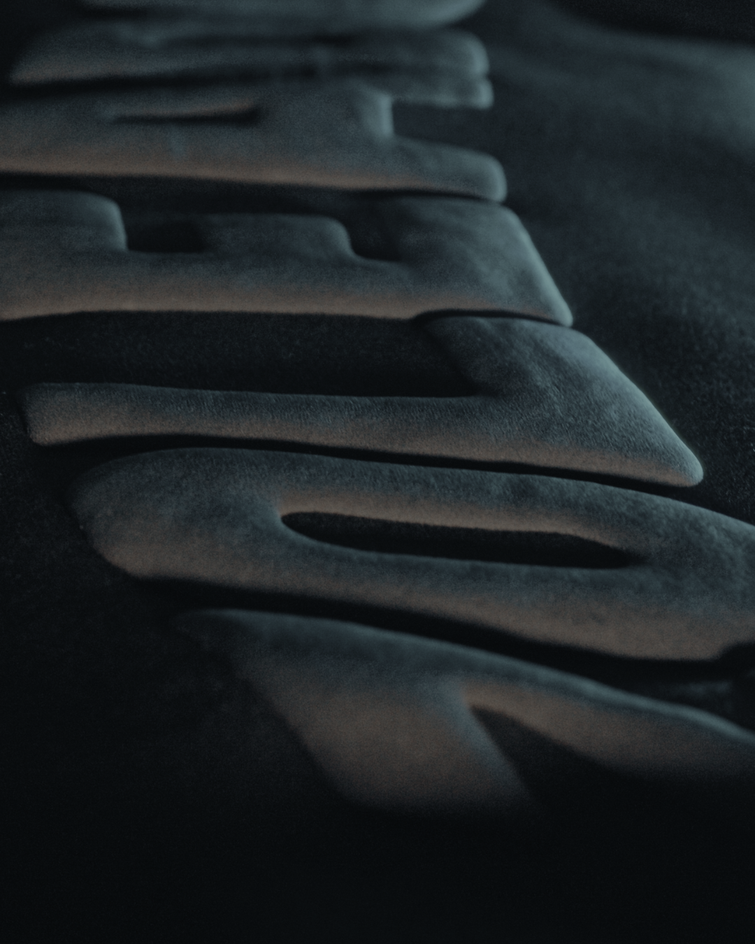 Close up of puff print saying 'ZOLEADO' on a black crewneck sweatshirt