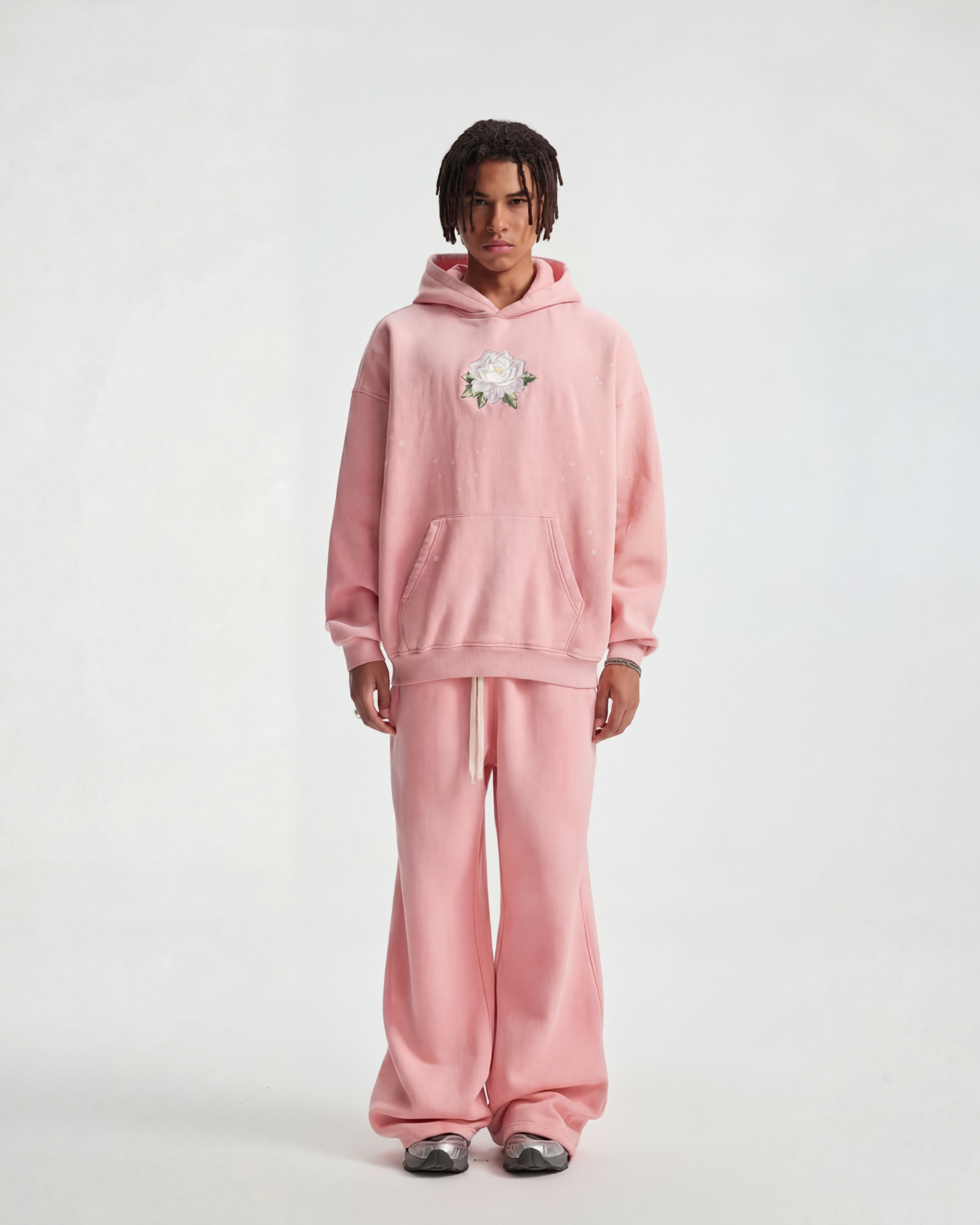Model wearing pink acid wash heavyweight boxy sweatpants with pink top, full zoleado pink set make model