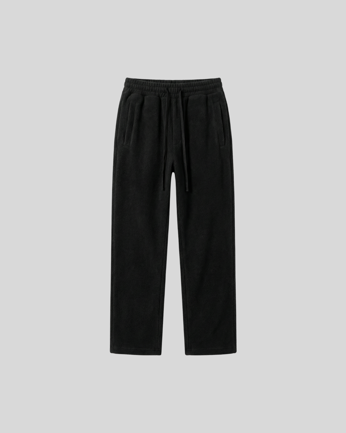 Black heavyweight pants on a light gray background