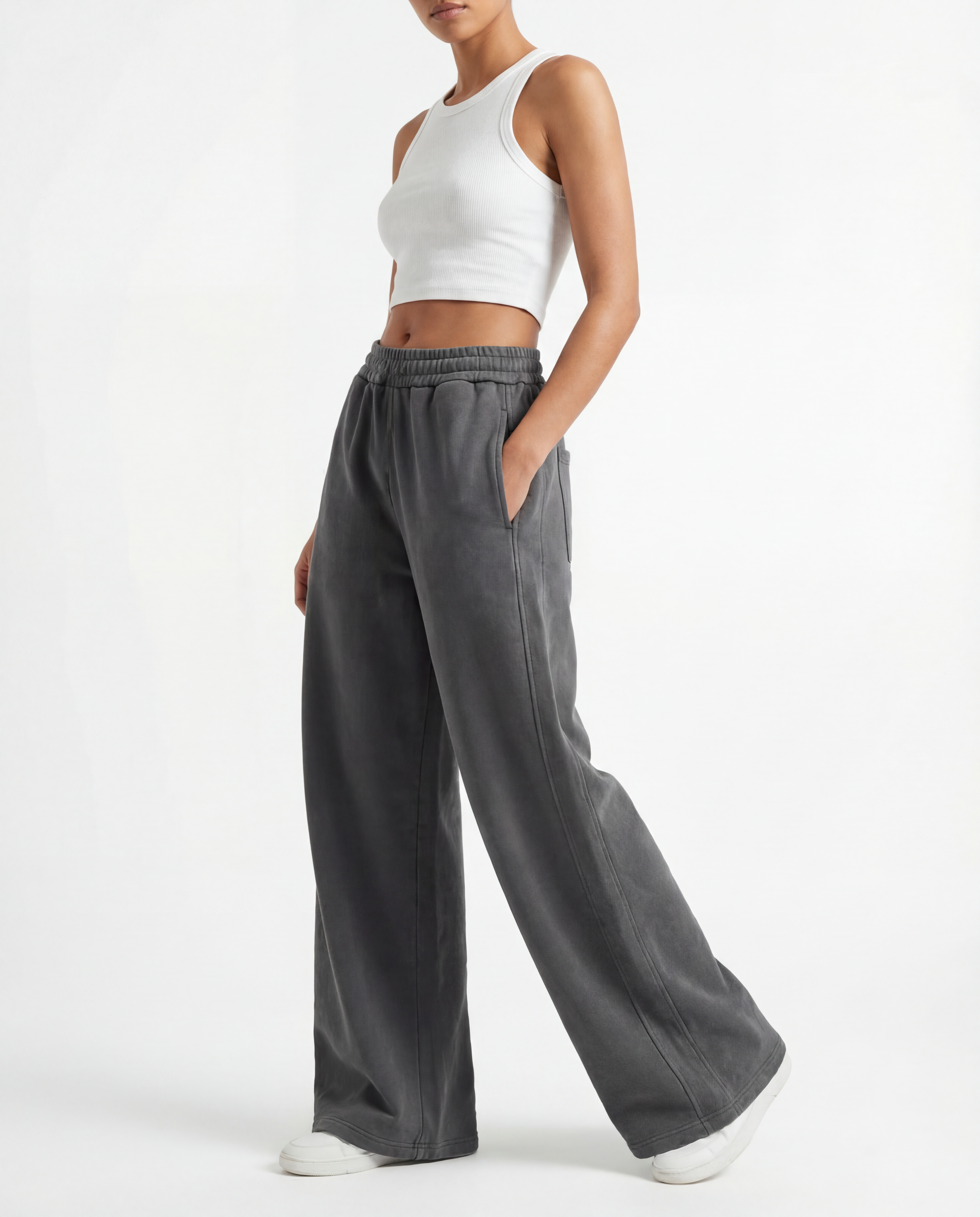 Model in gray wide-leg acid wash pants on light background