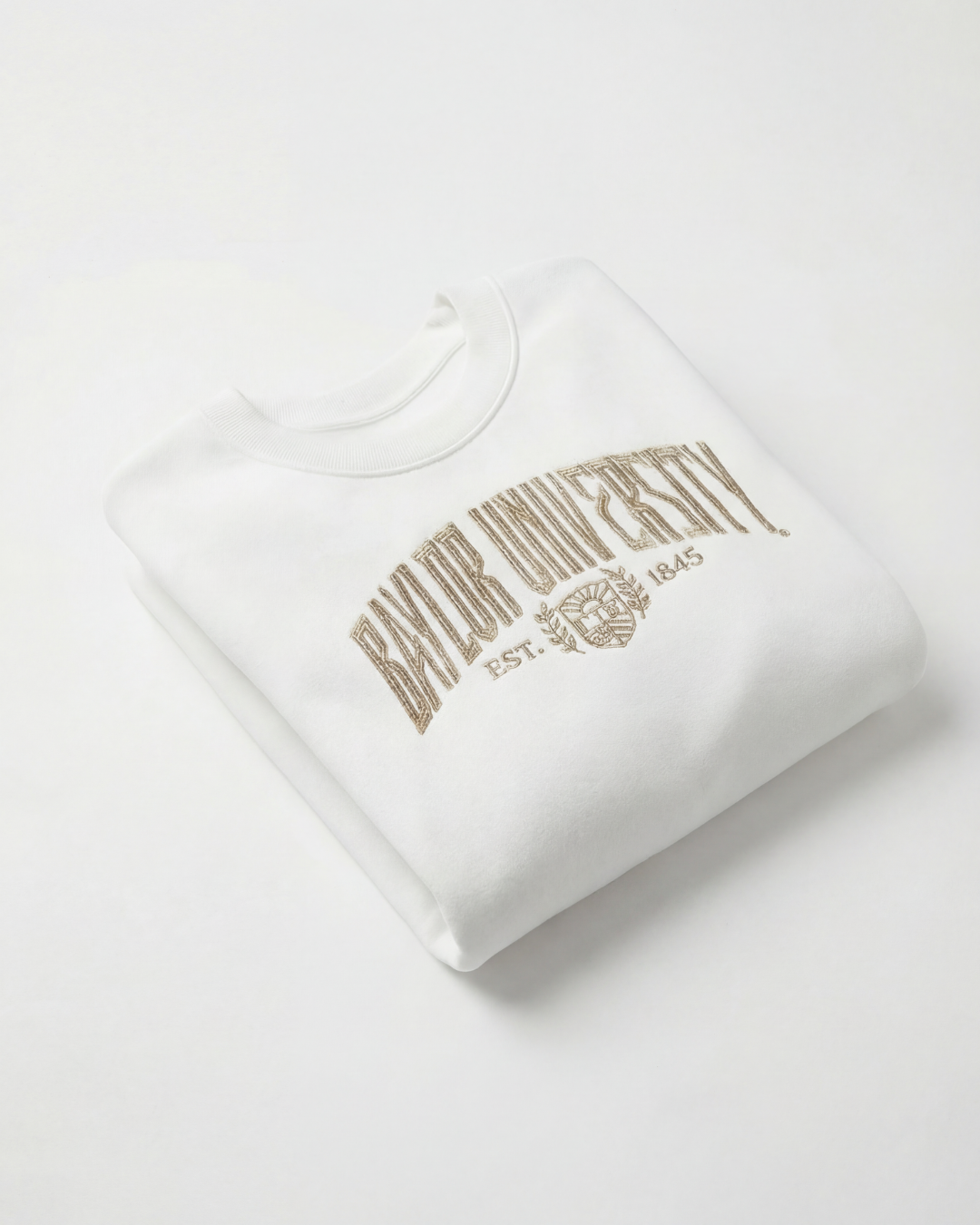 White sweatshirt with 'Baylor University' embroidered in gold on a white background