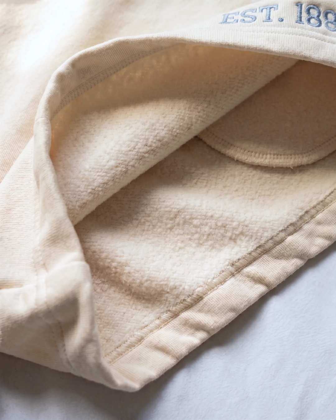 Tri Delta Mockneck interior stitching detail
