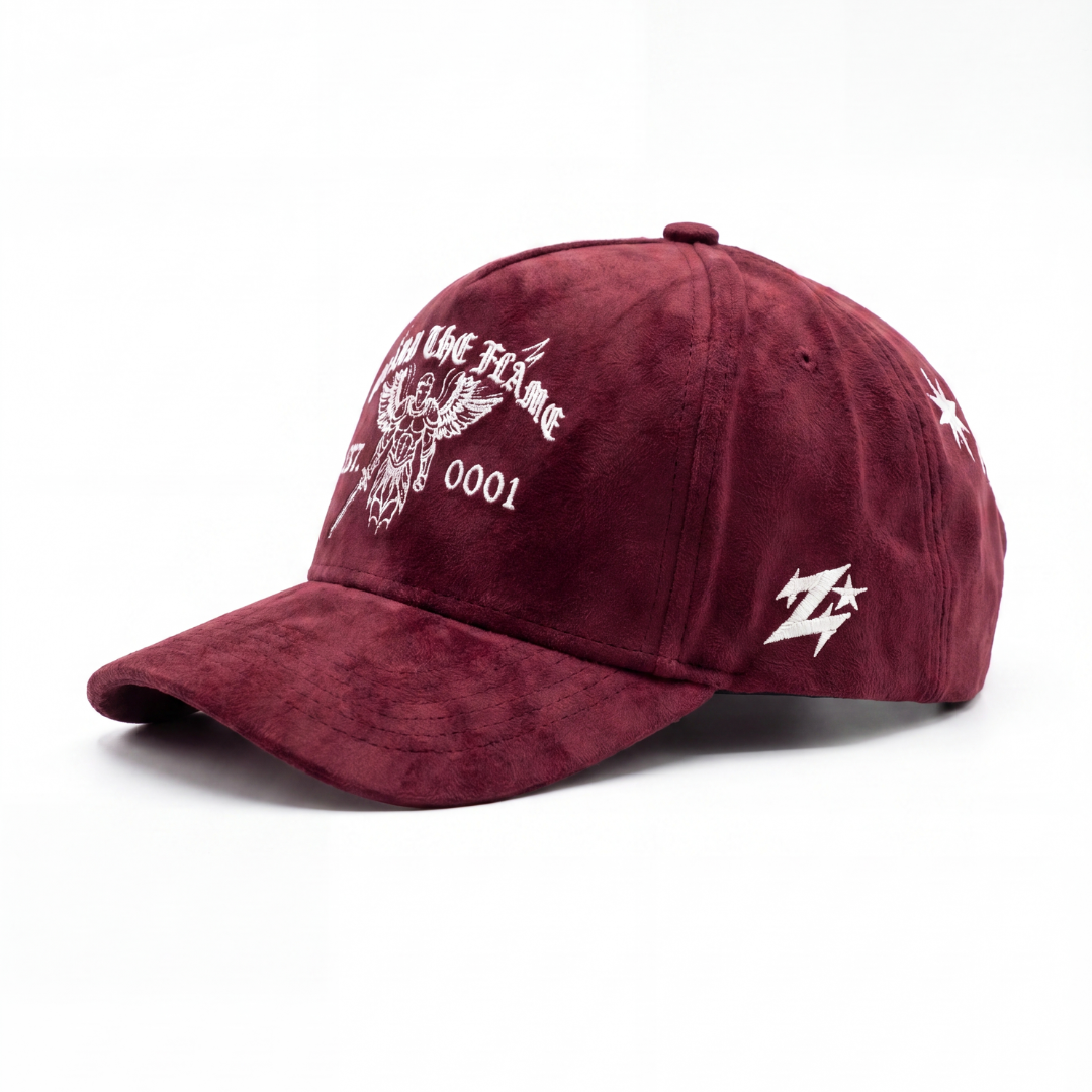 Guard the Flame hat back — white ZOLEADO blackletter embroidery with compass-star motif