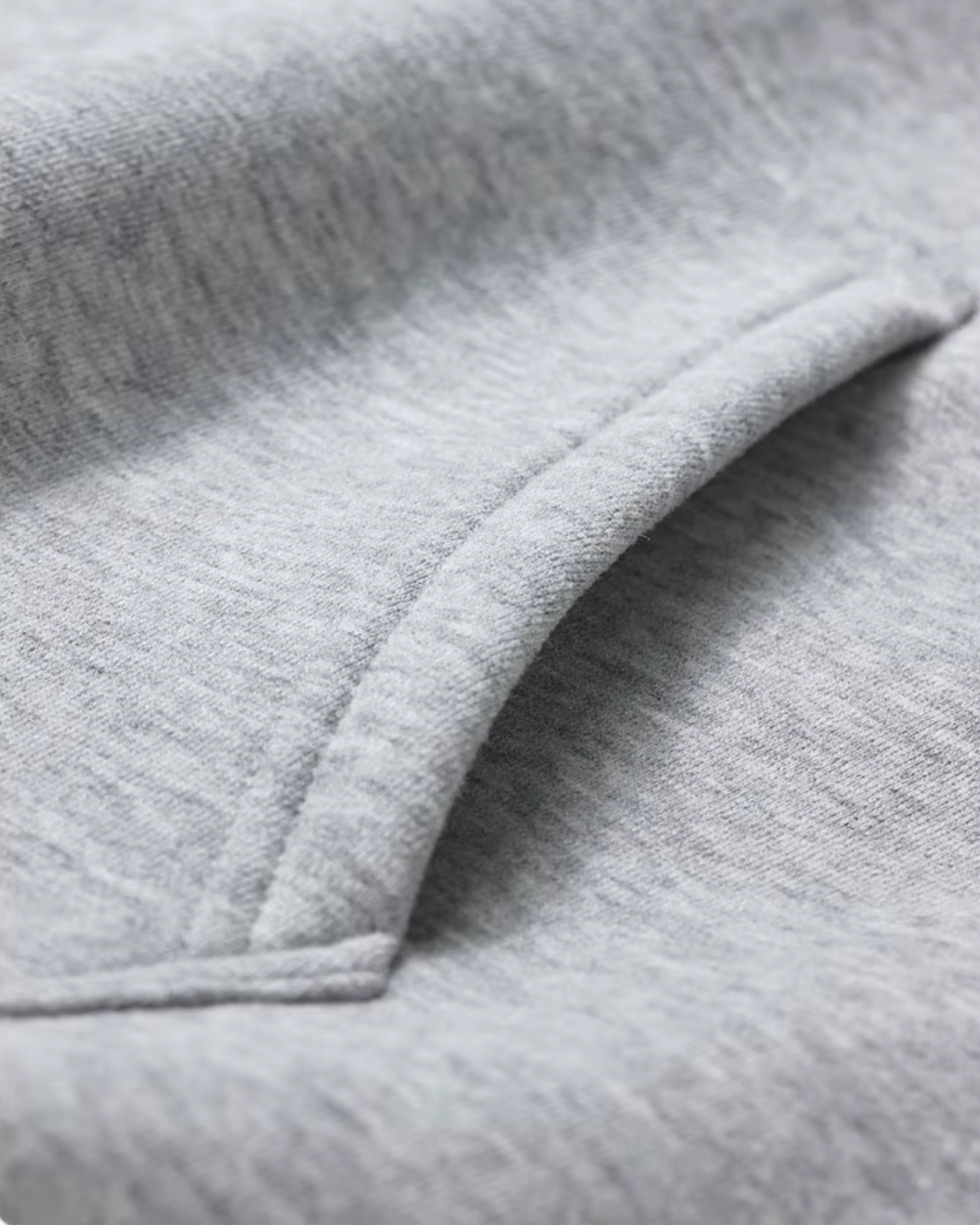 Close-up of gray fabric with a textured pattern