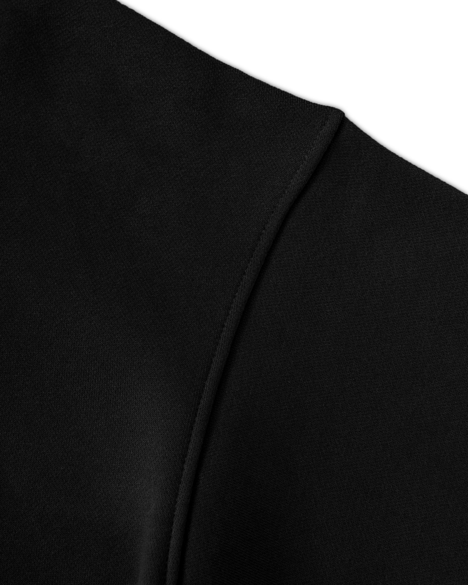 Close-up of a black Baylor University hoodie garment seams with a white background