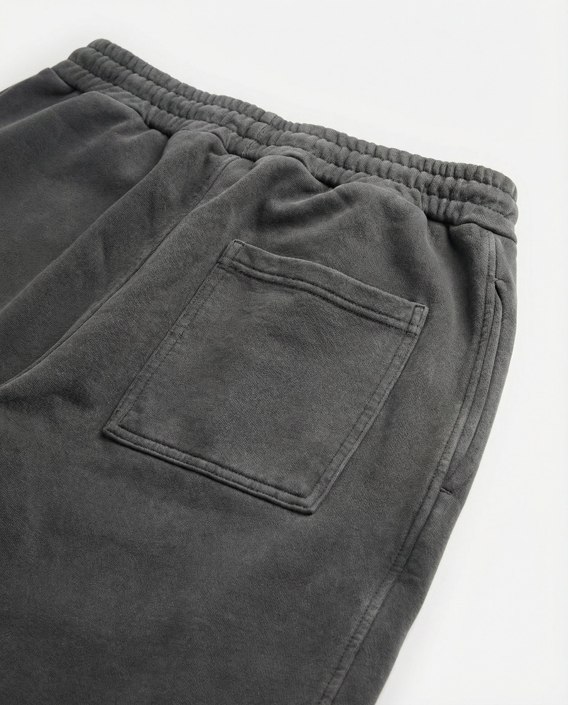 Gray sweatpants with a pocket on a white background