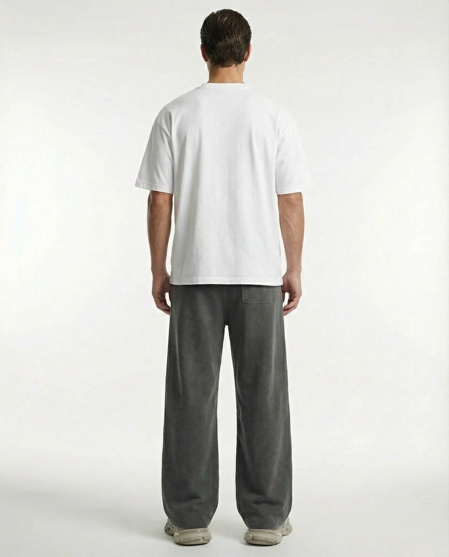 Model wearing gray wide-leg acid wash pants