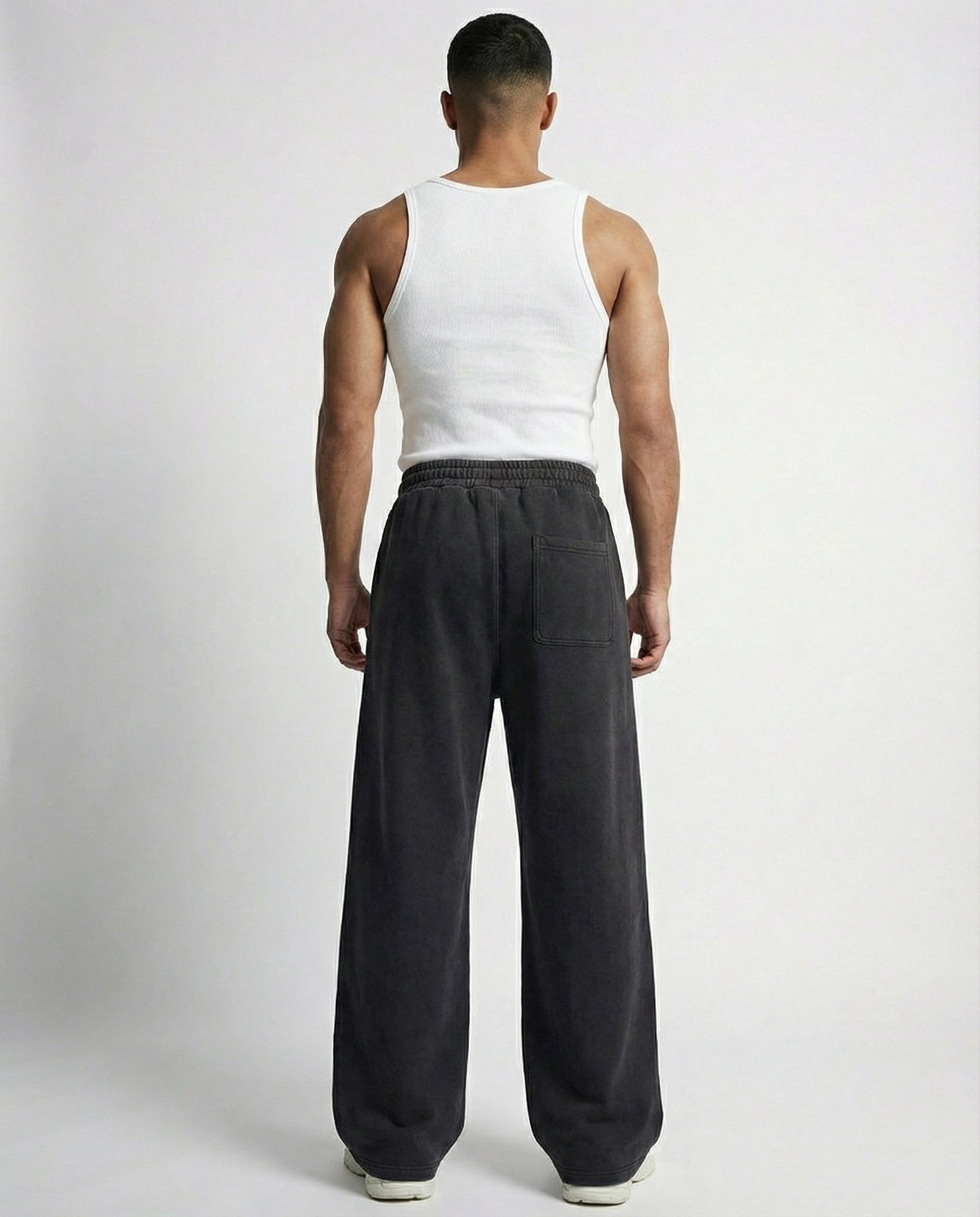 Model wearing black wide-leg acid wash pants