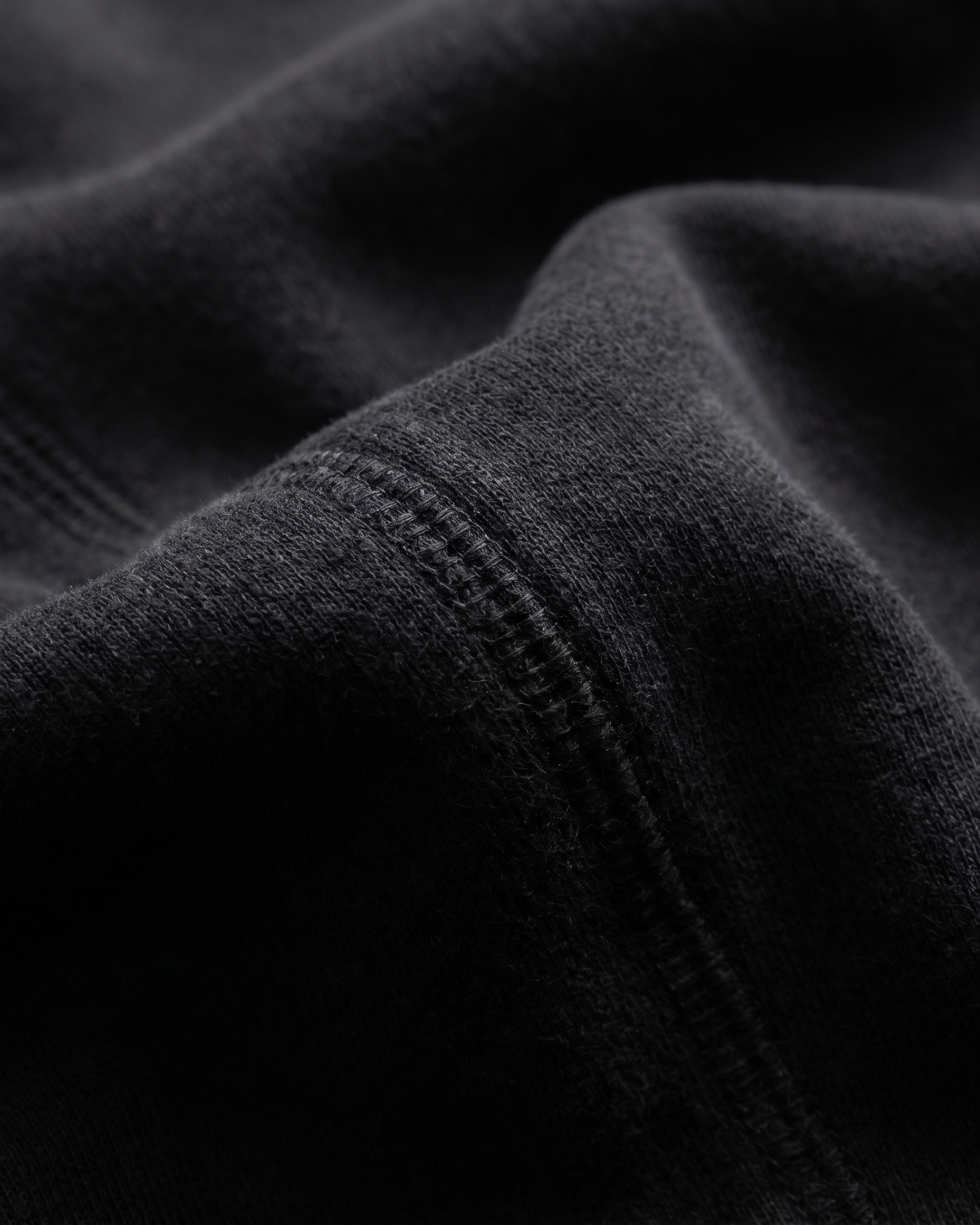 Kappa Alpha Theta 330 GSM black cotton fleece fabric texture detail