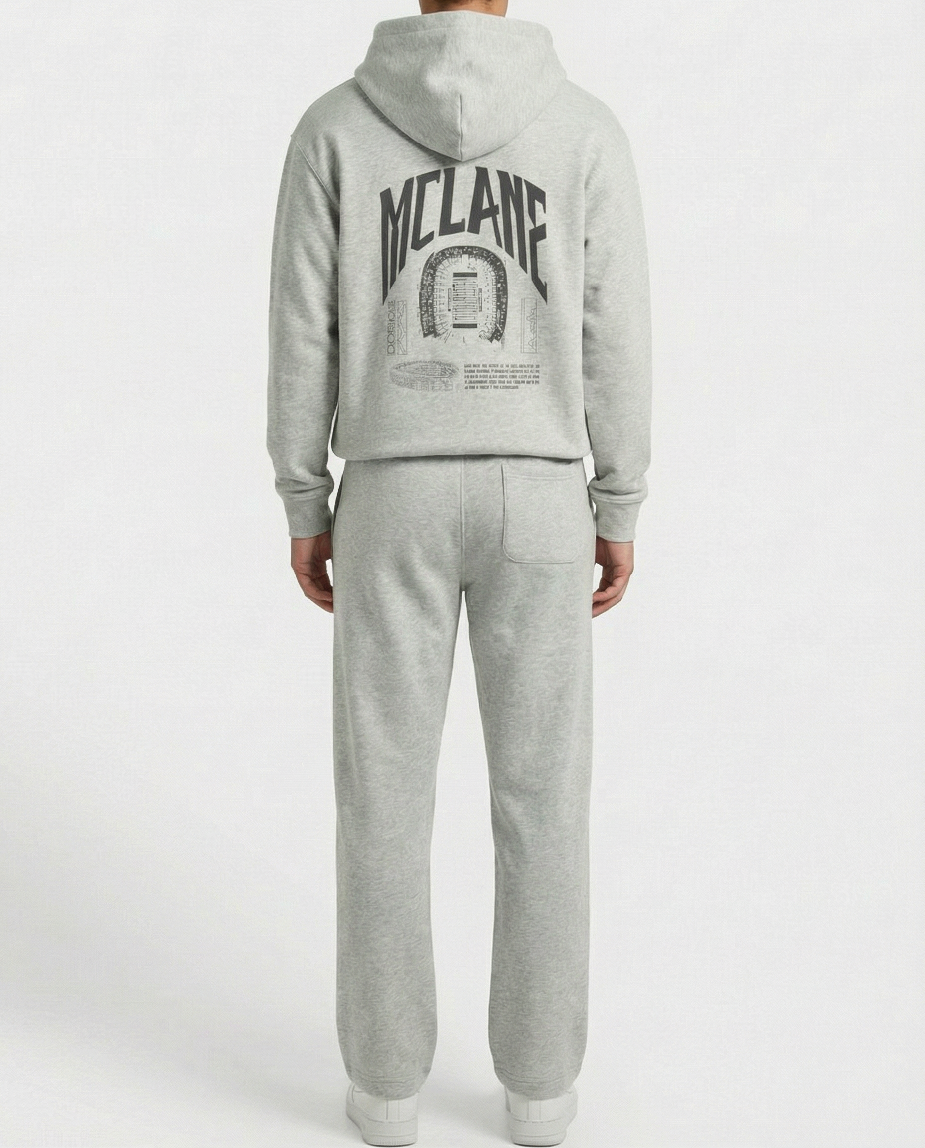 man wearing a gray baylor hoodie and pants with 'McLane' branding on a white background